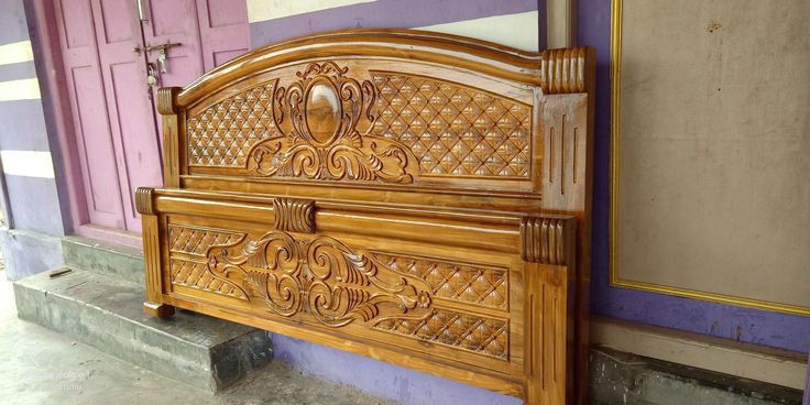 Ornately carved teak wood furniture piece